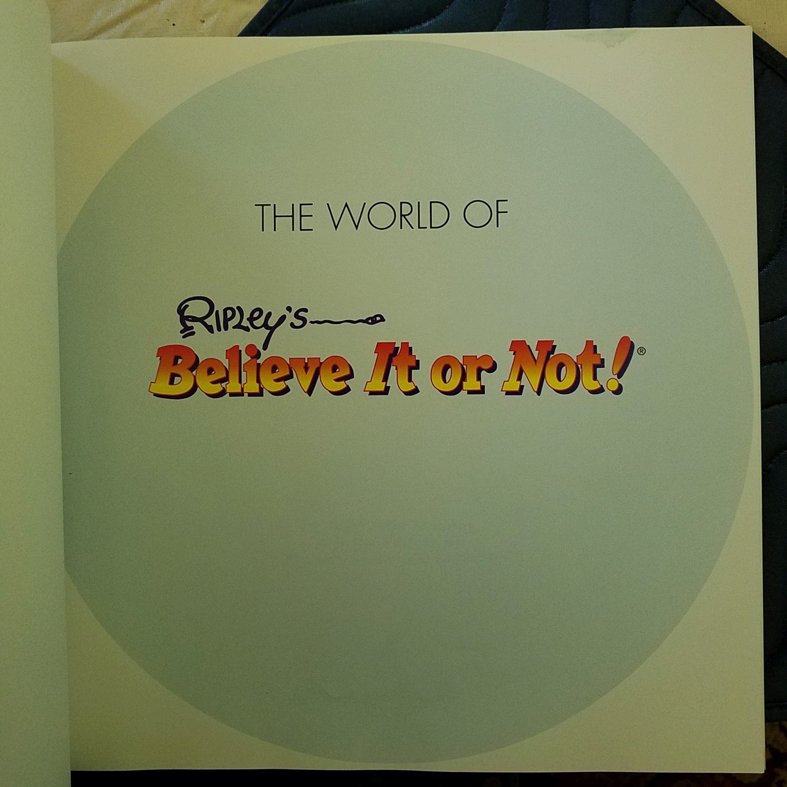 1999 HARDCOVER THE WORLD OF RIPLEY’S BELIEVE IT OR NOT BOOK. 159 PAGES