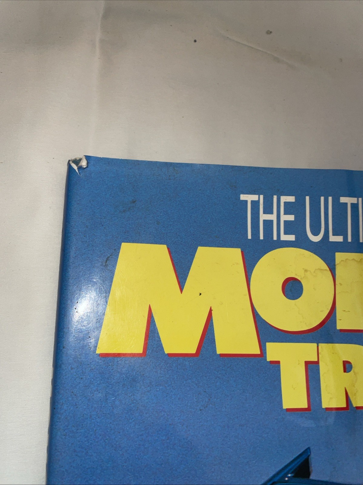 ULTIMATE BOOK OF MONSTER TRUCKS By Bill Holder – As Is Damage Bigfoot Ford 1990