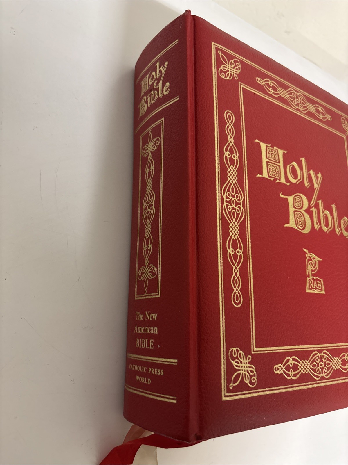 Holy Bible NAB Red. The New American Bible. Catholic Press World