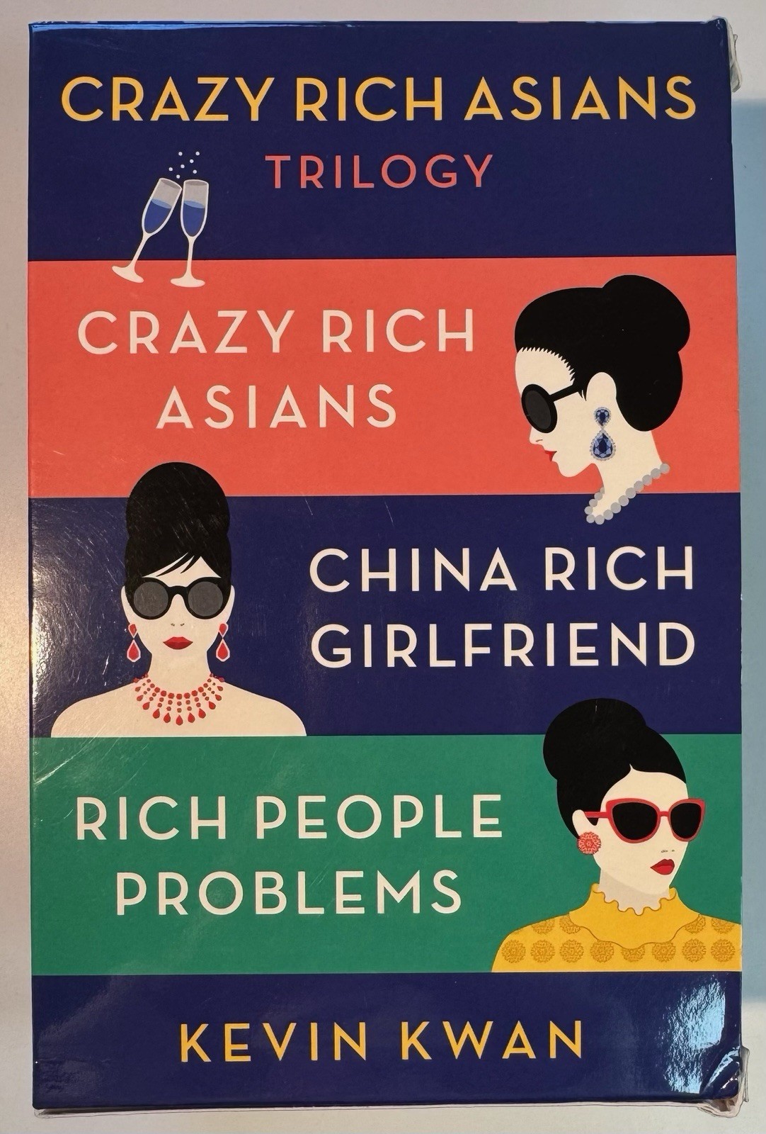 Paperback book box set titled ‘Crazy Rich Asians Trilogy’ by Kevin Kwan.