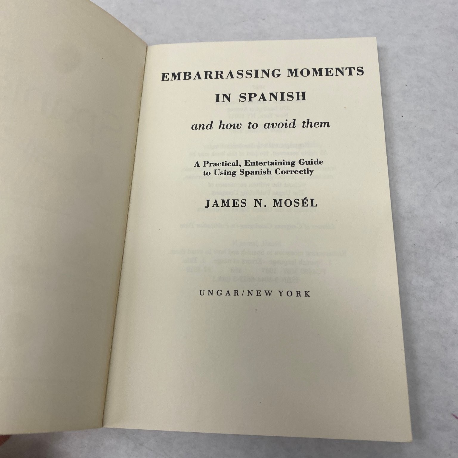 Embarrassing Moments in Spanish James N. Mosél 1987 10th Printing Language Guide