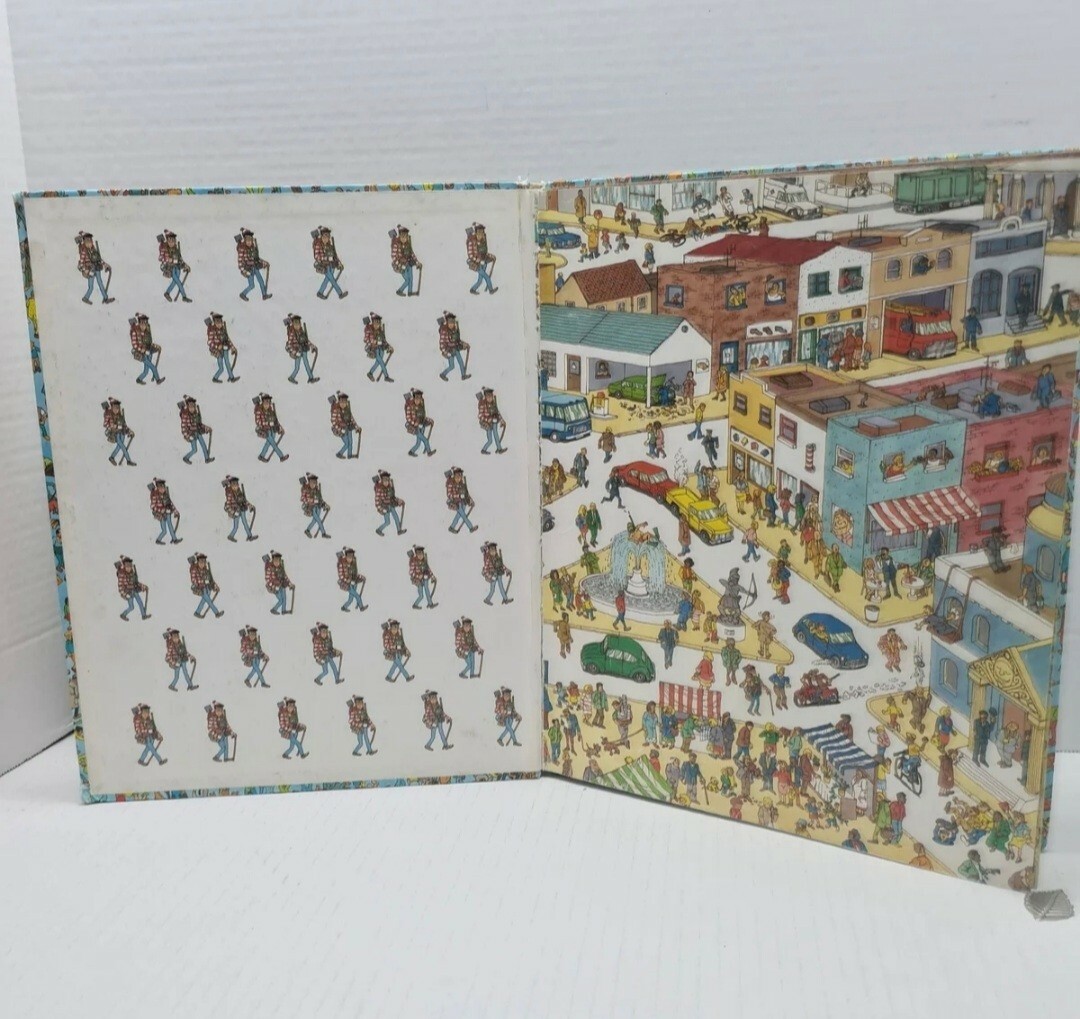 2 wheres waldo books one soft cover one 1987 banned edition “Beach Nude woman “