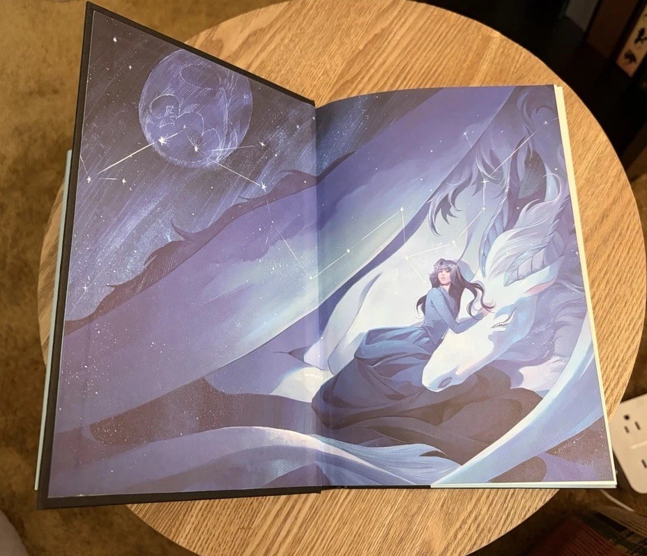 When The Moon Hatched by Sarah A. Parker Hardcover with Blue Sprayed Edges