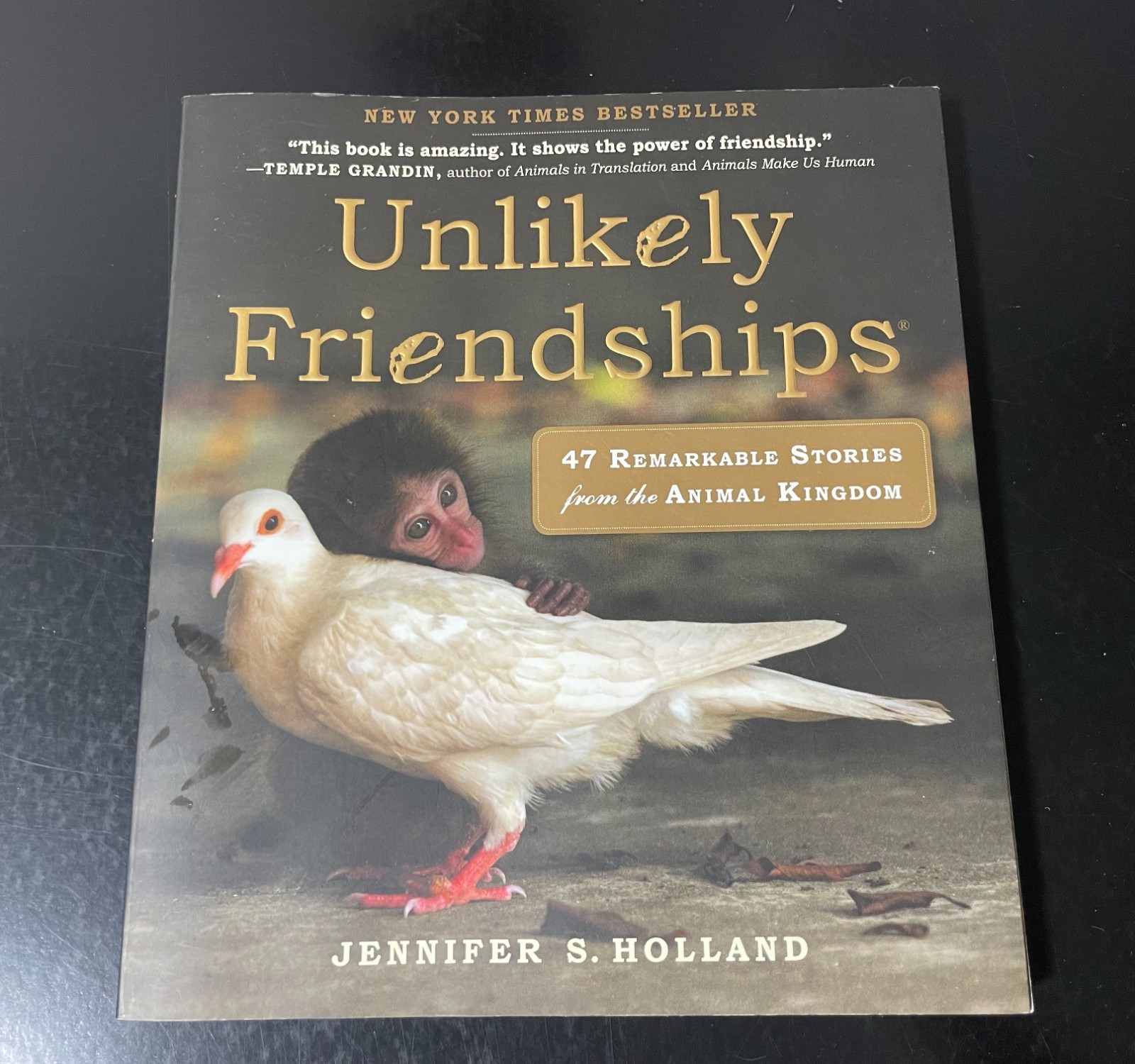 UNLIKELY FRIENDSHIPS BY JENNIFER S. HOLLAND 47 STORIES FROM THE ANIMAL KINGDOM