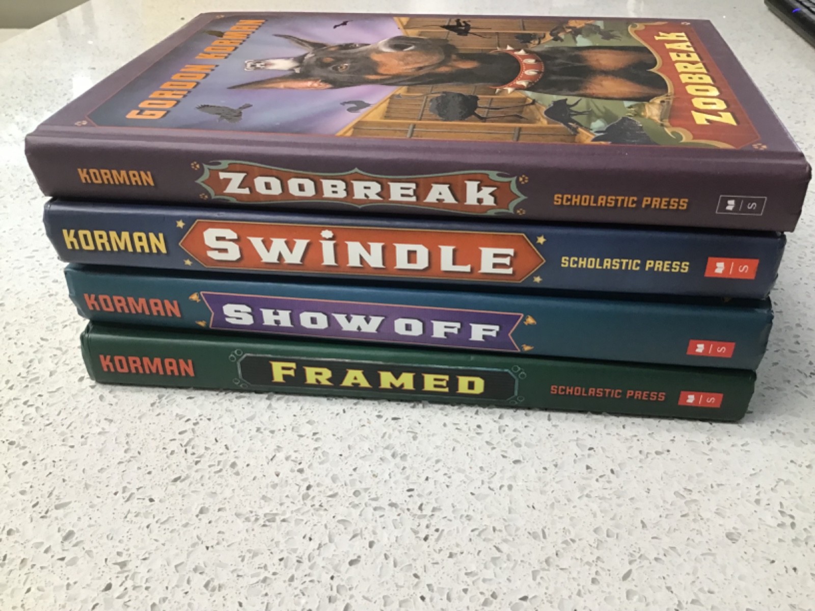 The Swindle Series by Gordon Korman (lot of 4) Scholastic Press 2009