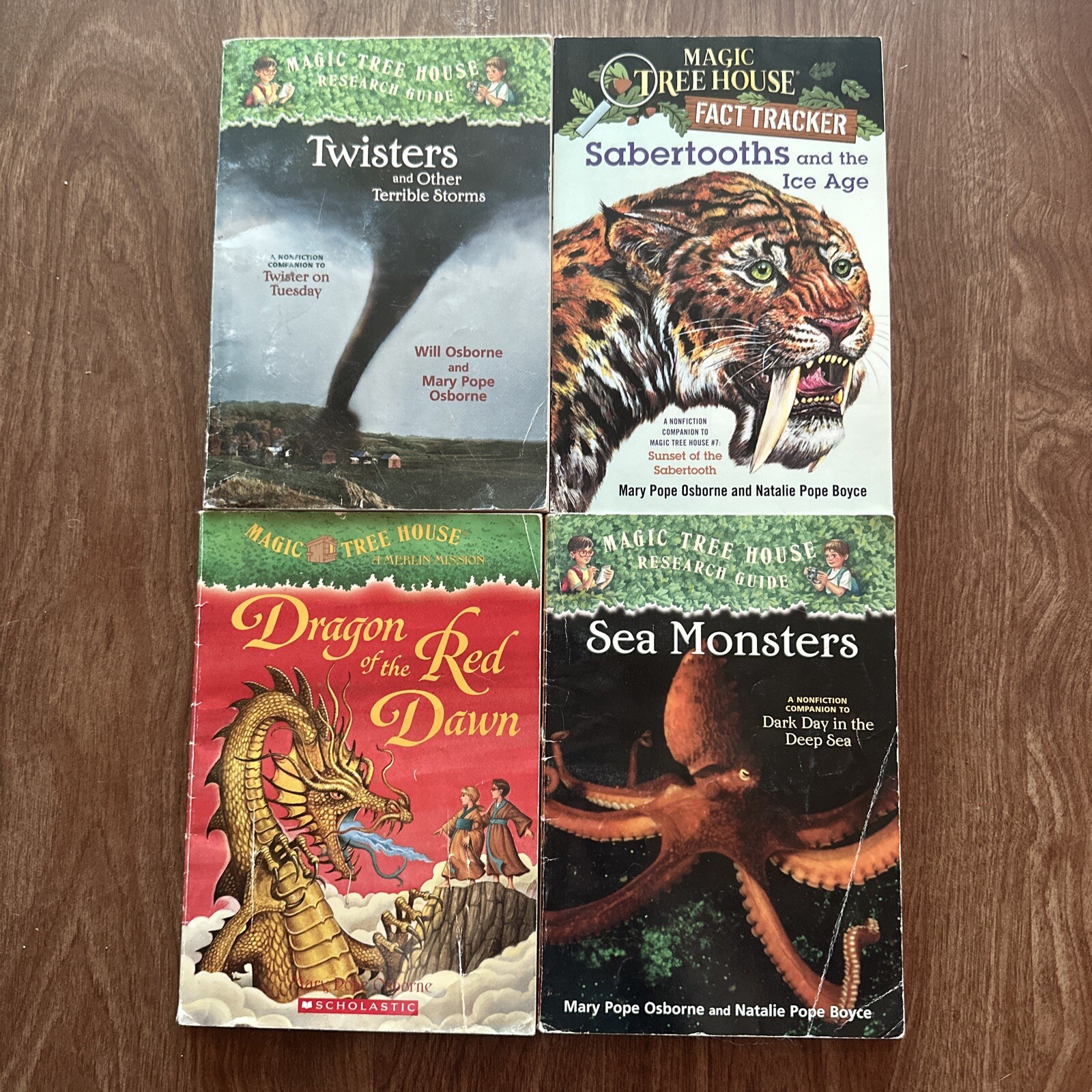 Lot of 4 Magic Tree House Fact Trackers & Research Guides Twisters Sabertoorhs