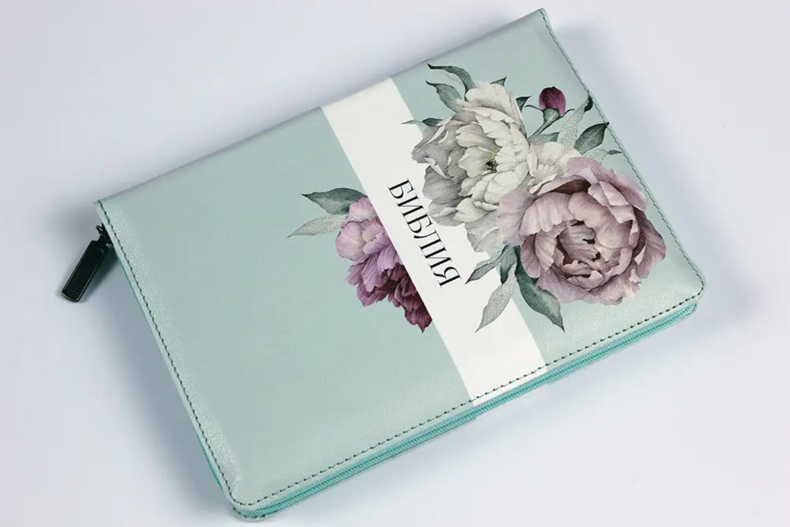 Bible with a lock. Desing Peonies, floral print on the cut pages. Greate Gift