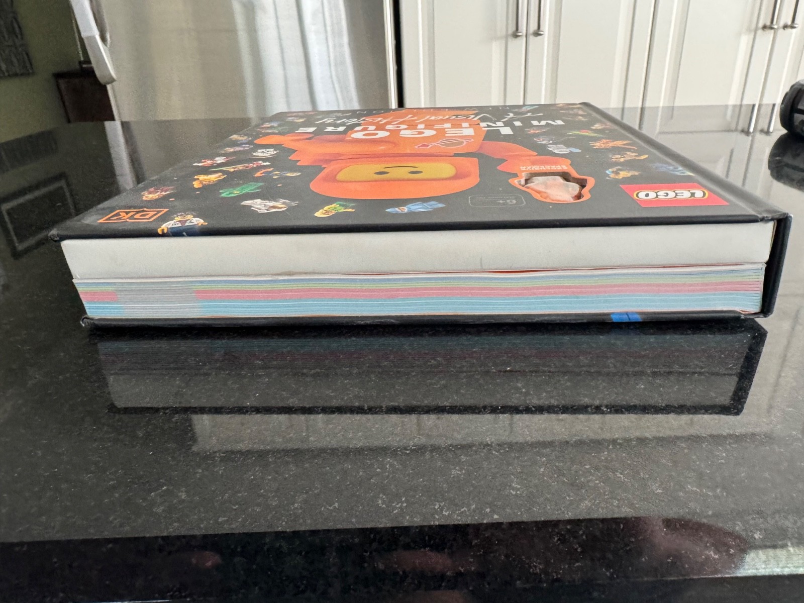 LEGO MINIFIGURE A Visual History – New Edition – With Exclusive Orange Spaceman!
