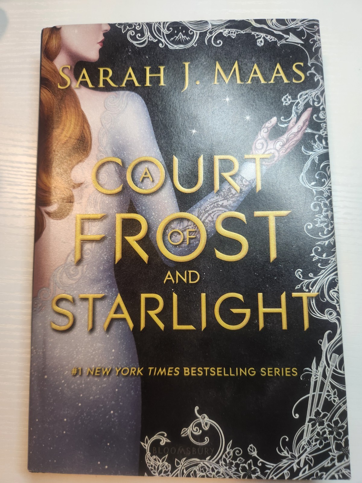a cort of thorns and roses set
