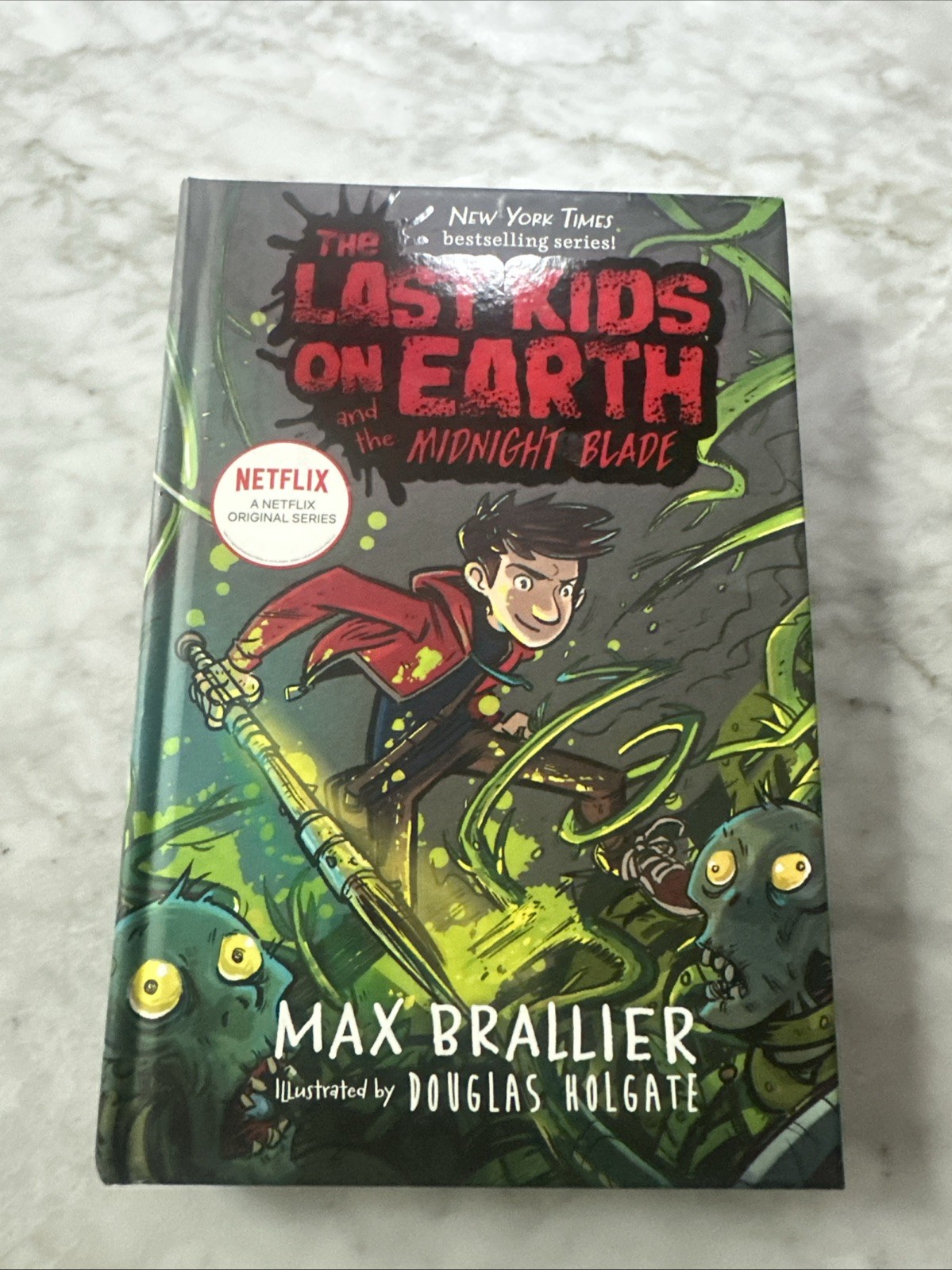 Last Kids on Earth and the Midnight Blade by Max Brallier and Douglas Holgate…