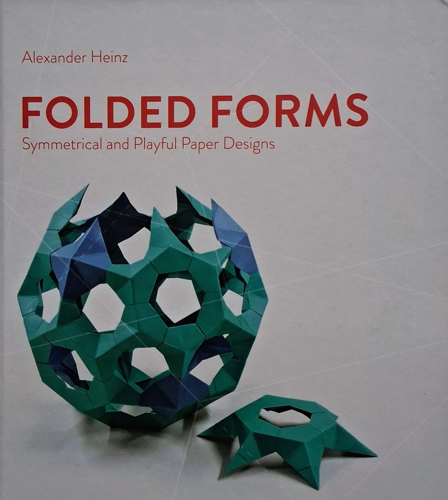 “Folded Forms- Symmetrical and Playful Paper Designs” by Alexander Heinz