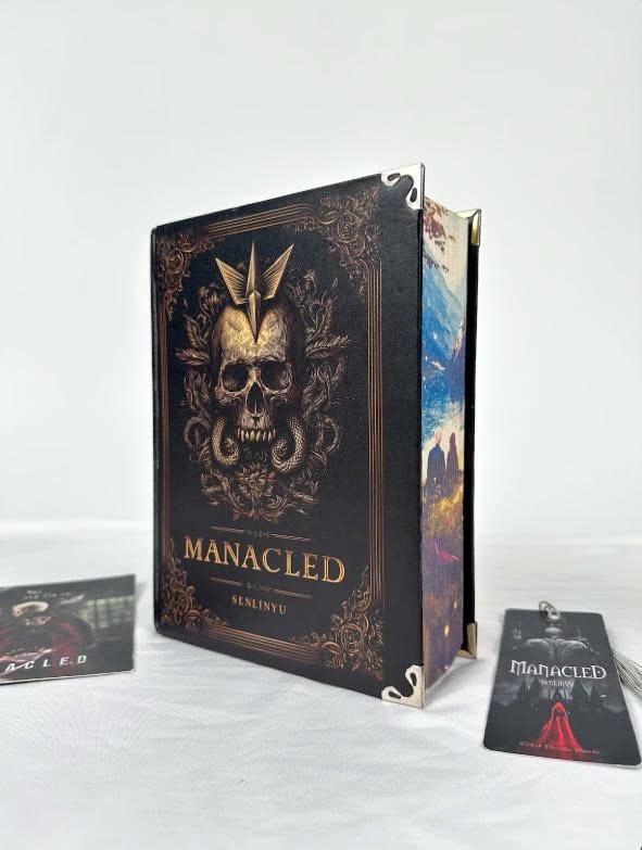 Limited edition hardcover Manacled book with 3 sided color spray bookmark card