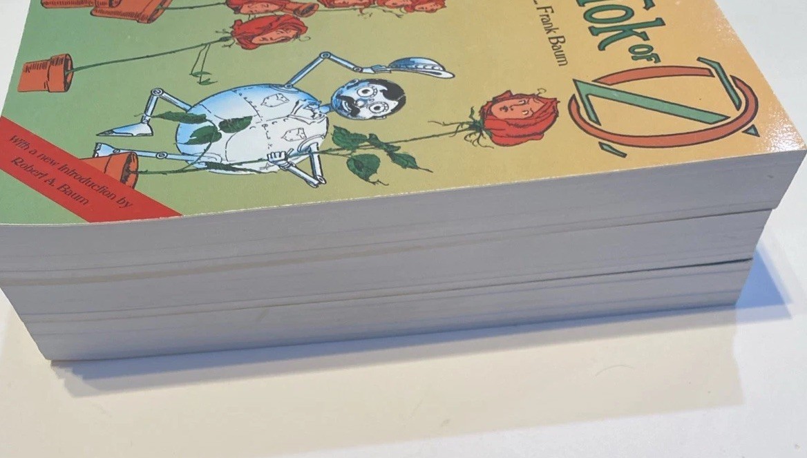 Lot of 3 L. Frank Baum Wizard of Oz paperback books. Very Good Condition