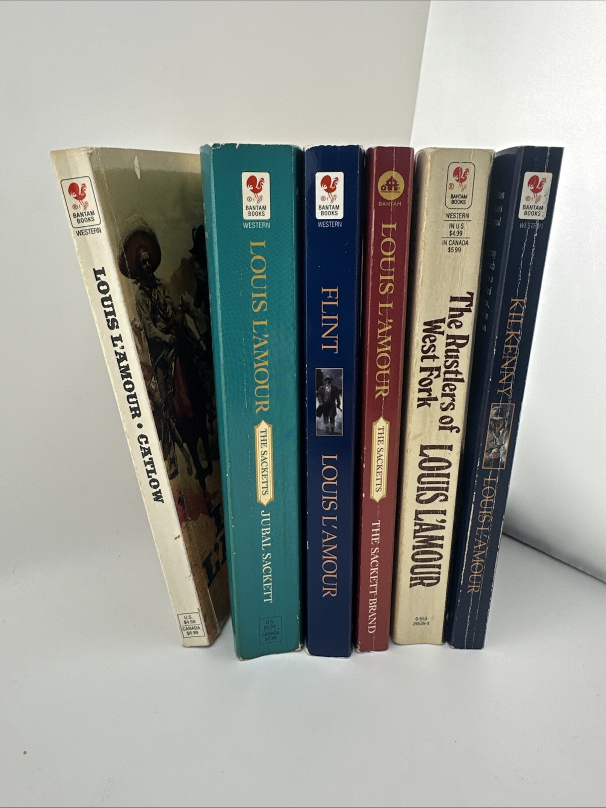Lot of 6- LOUIS L’AMOUR – Paperback Western Books – Mixed Titles