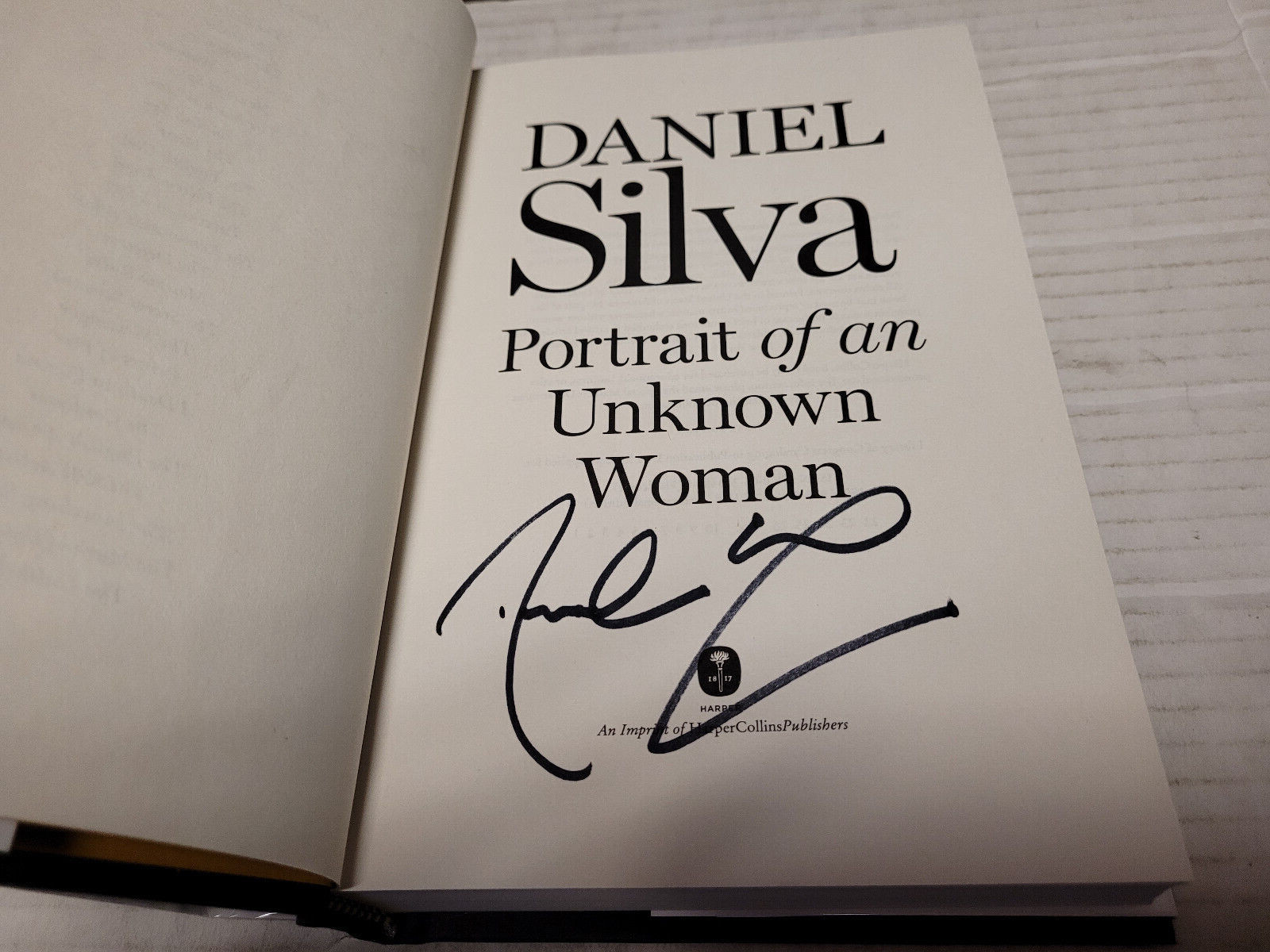 Portrait of an Unknown Woman by Daniel Silva (2022, HC) SIGNED 1st/1st FLAT SIGN