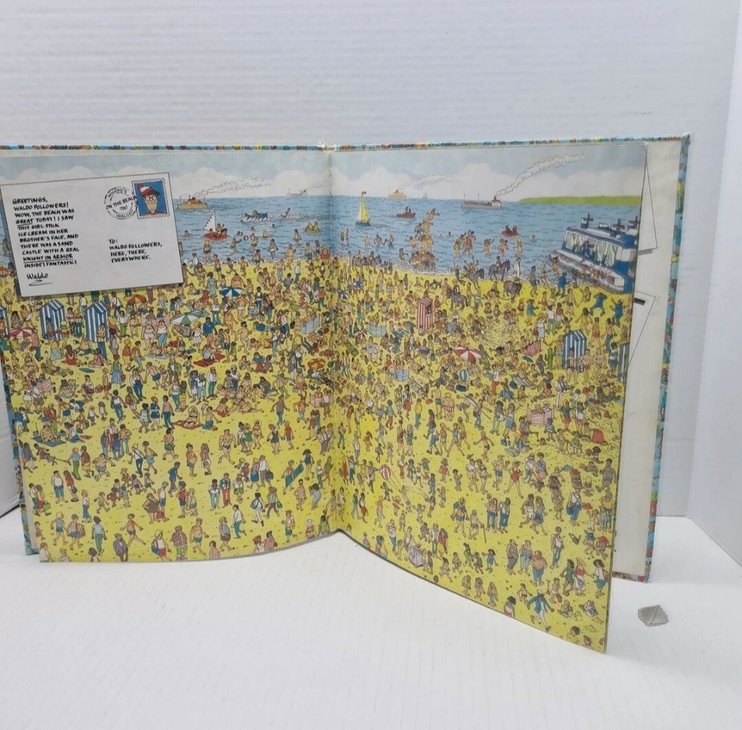 2 wheres waldo books one soft cover one 1987 banned edition “Beach Nude woman “