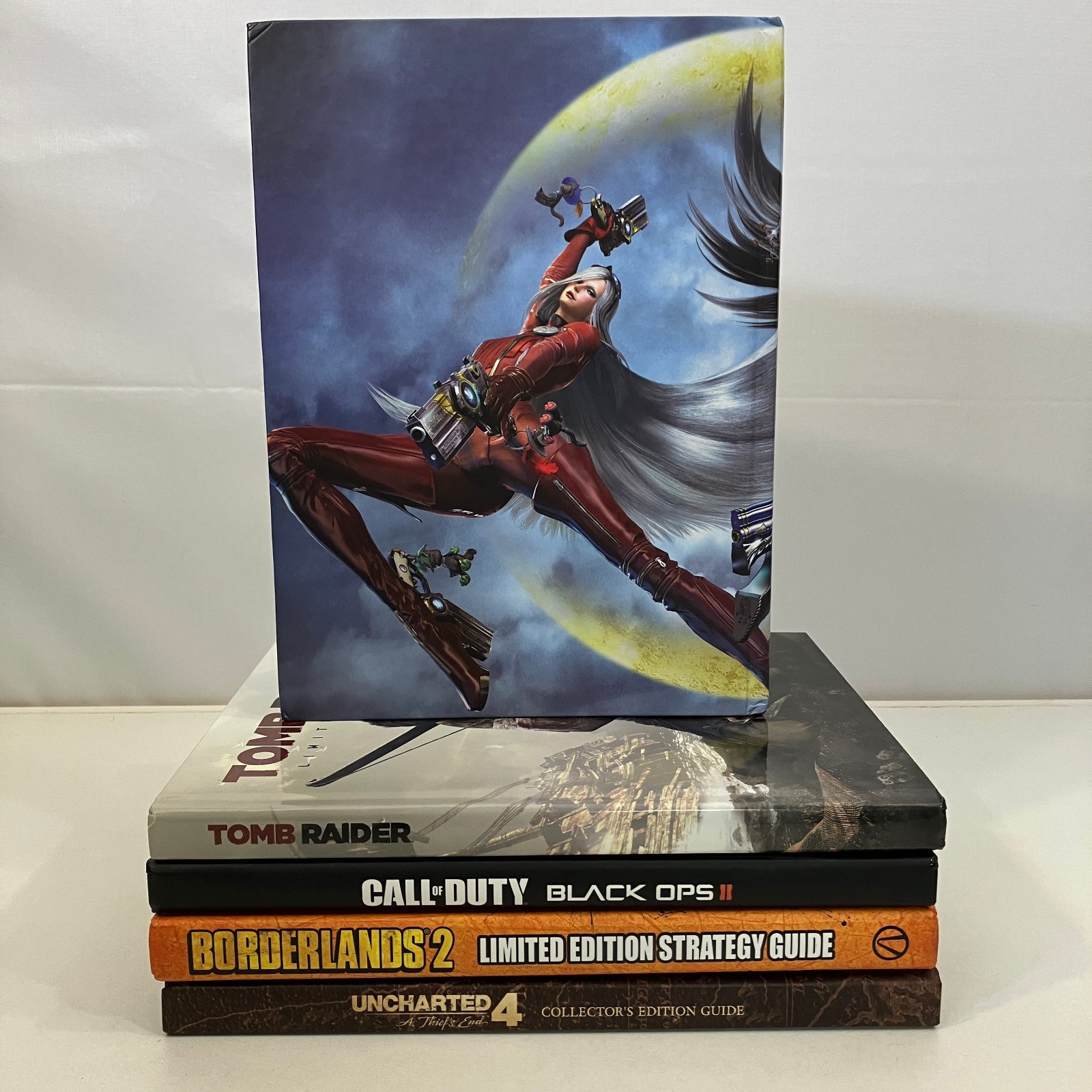 5 Misc Video Game Hardcover Guides Various Editions Lot Bayonetta Uncharted VGC