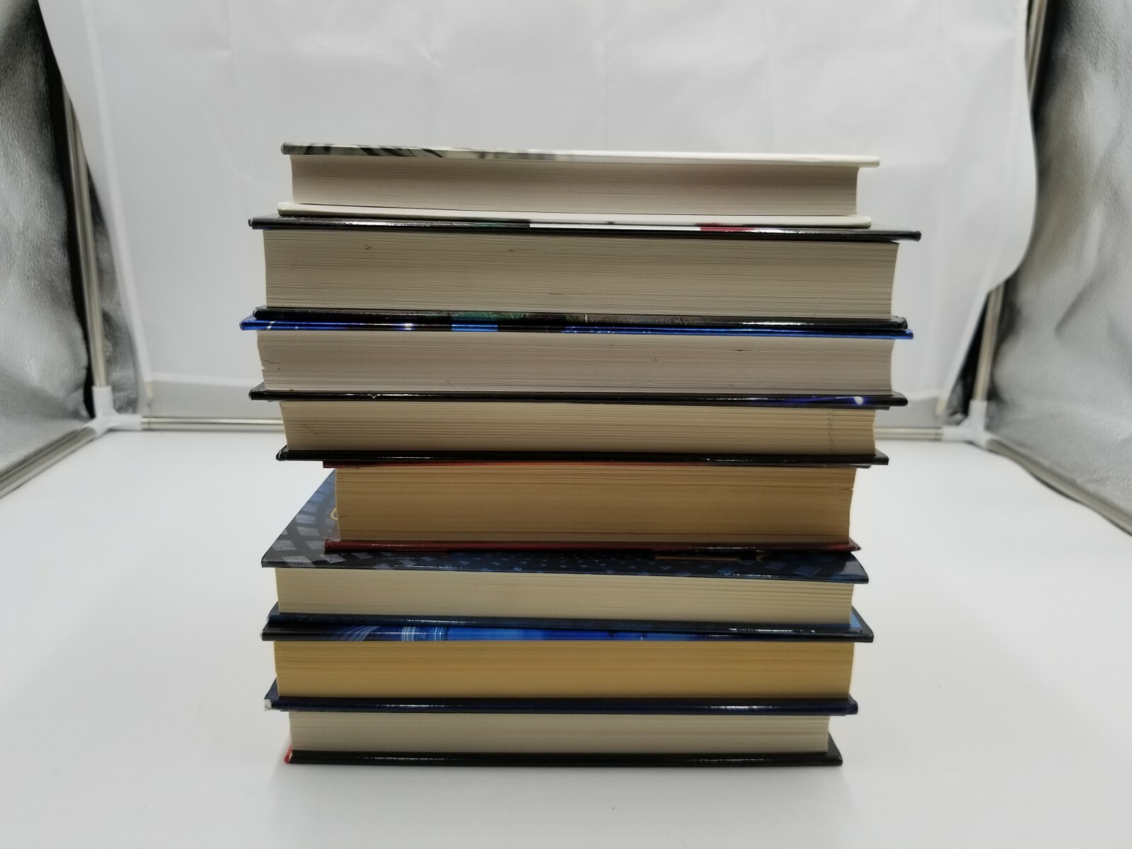 Lot of 8 Books Oliver North Ken Follet & more. See pictures