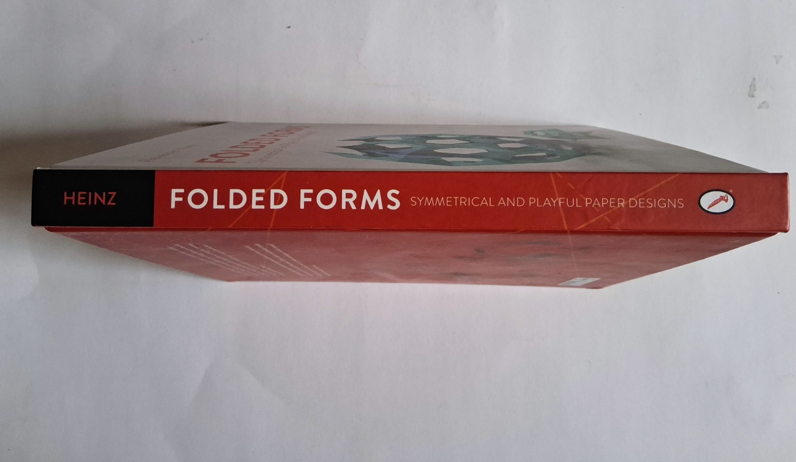 “Folded Forms- Symmetrical and Playful Paper Designs” by Alexander Heinz
