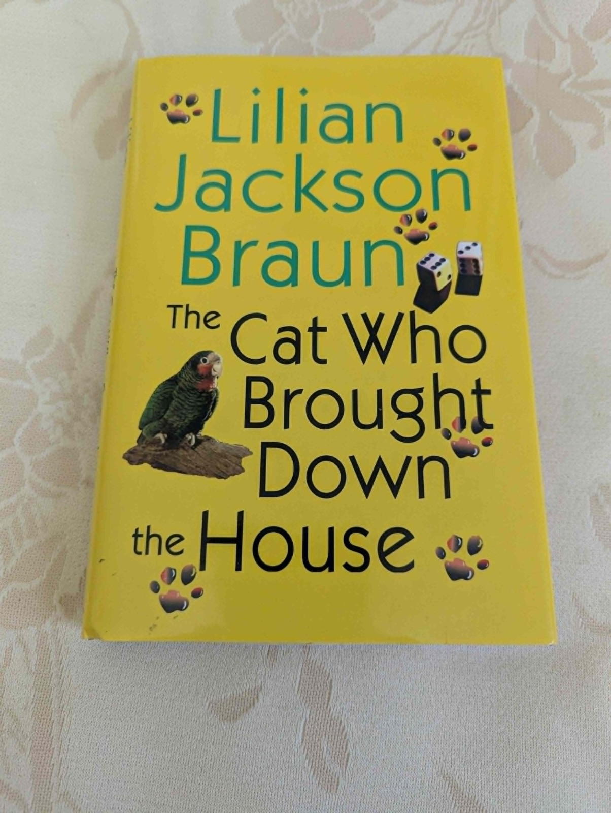 4 “The Cat Who” books by Lilian Jackson Braun, 1 by Rita Mae Brown (“Tail Gait”)