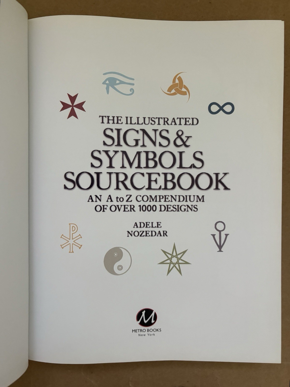 Illustrated Signs and Symbols Sourcebook 2010 by Adele Nozedar