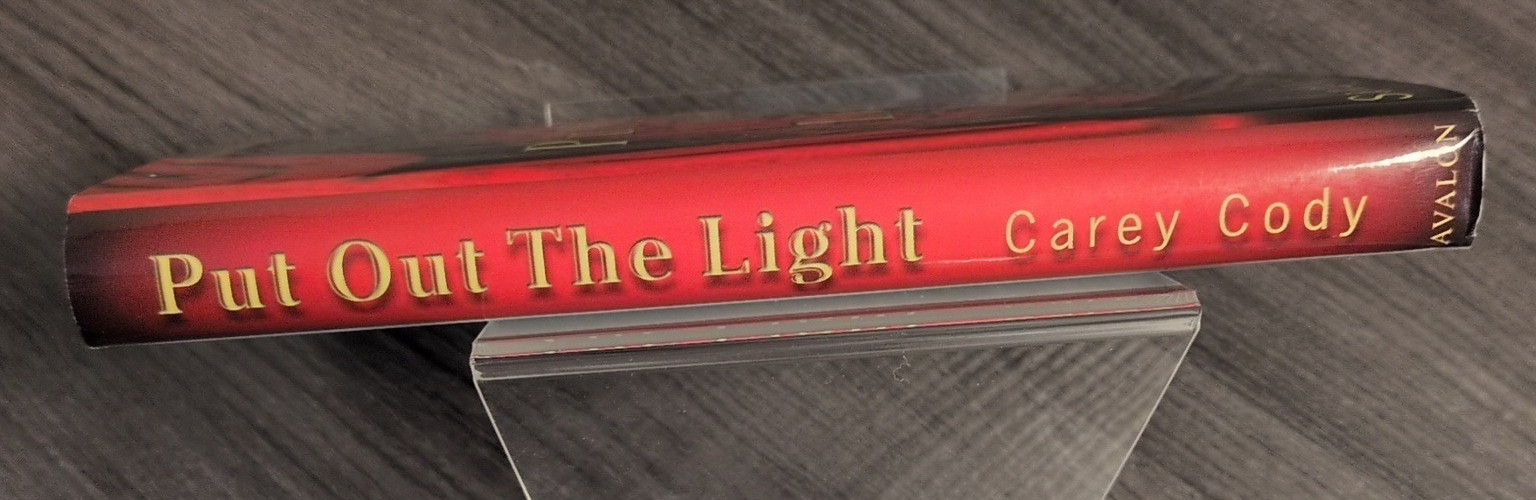 An Avalon Myuster 2 book bundle: Put Out the Light & Left At Oz – Signed HC