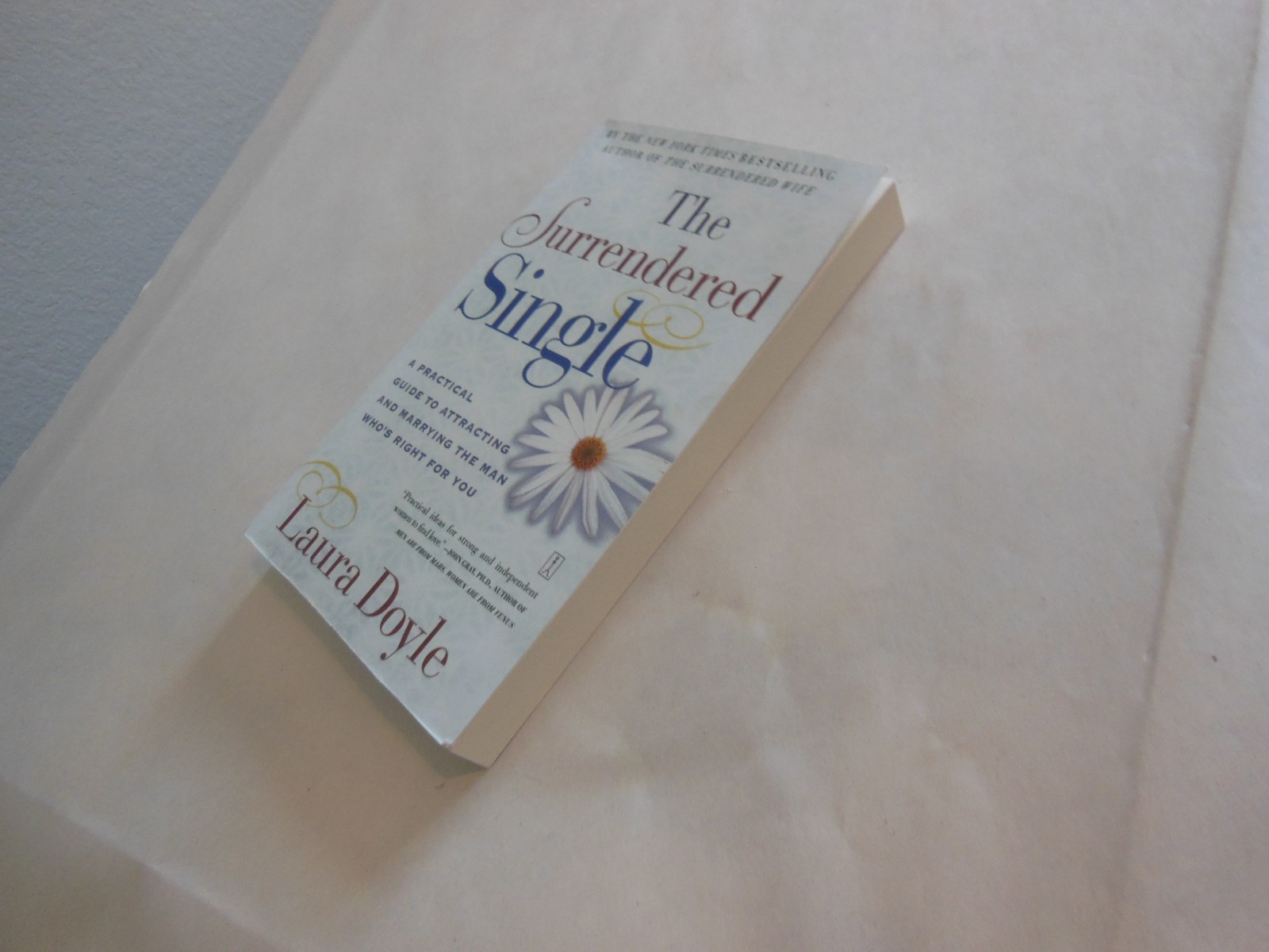 Surrendered Single : A Practical Guide to Attracting and Marrying the Man Who’s