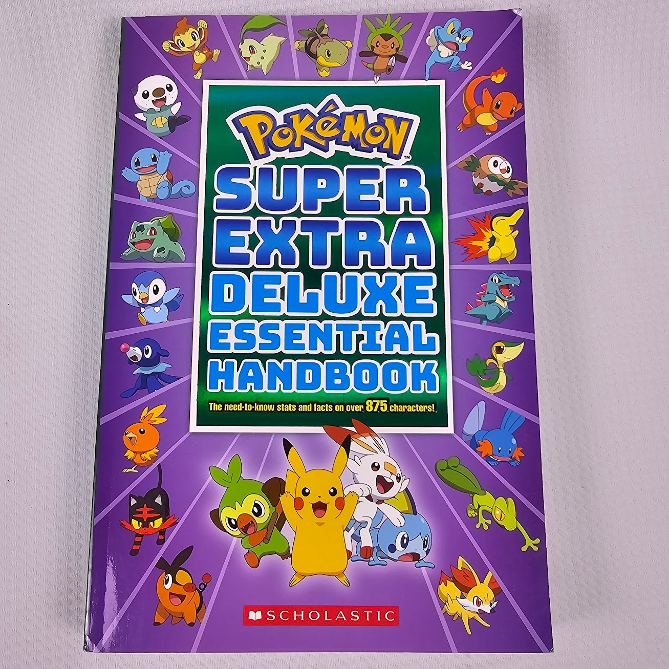 Pokémon Super Extra Deluxe Essential Handbook Schoolastic Paperback