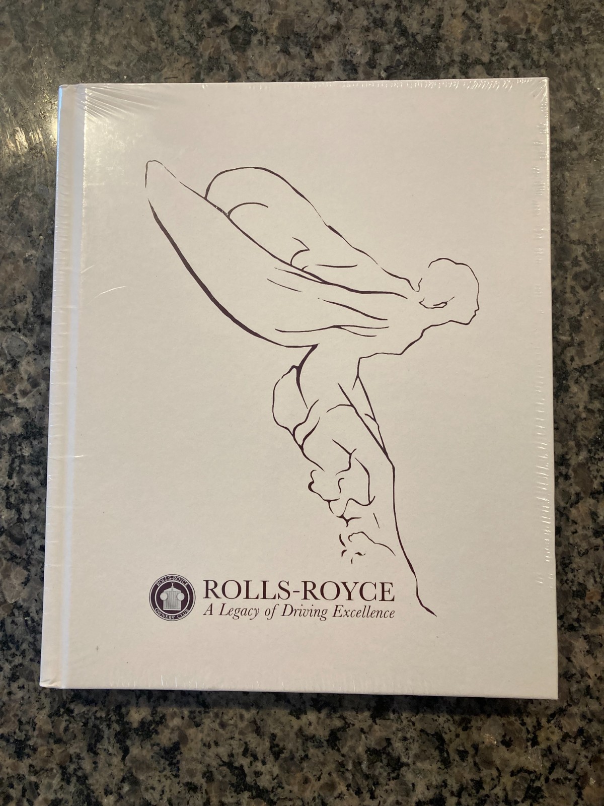 ROLLS-ROYCE FACTORY SEALED 2014 HARDBOUND BOOK A LEGACY OF DRIVING EXCELLENCE.