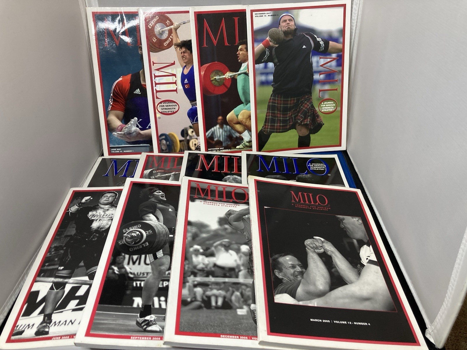WEIGHTLIFTING-MILO JOURNALS FOR SERIOUS STRENGTH ATHLETES. LOT OF 12. 2005-2007