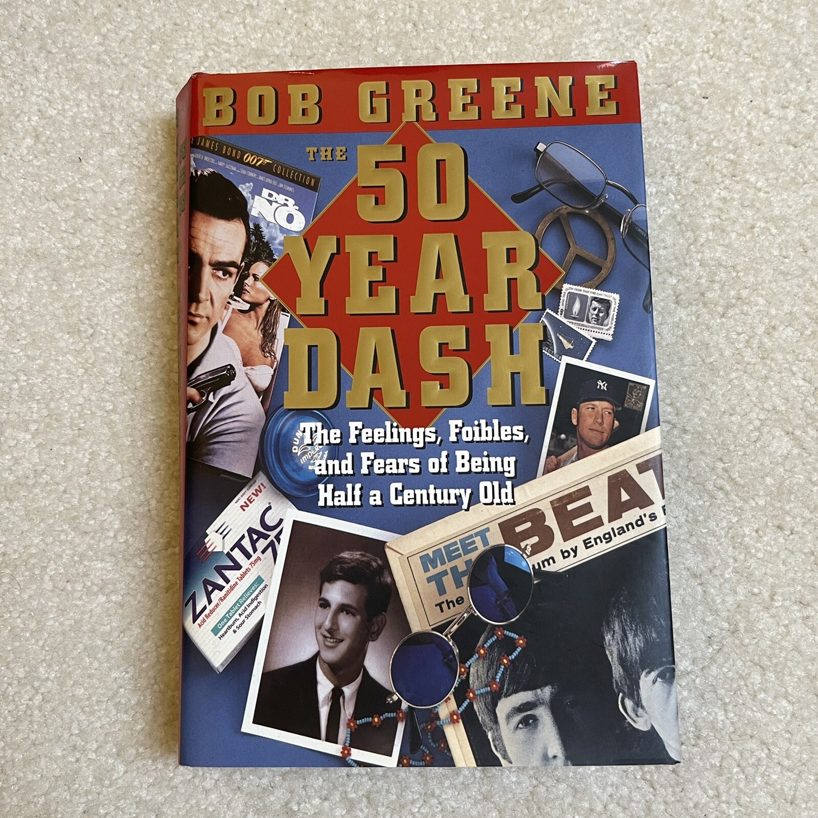 The 50 Year Dash: The Feelings, Foibles and Fears of Being a Half Century Old Hc
