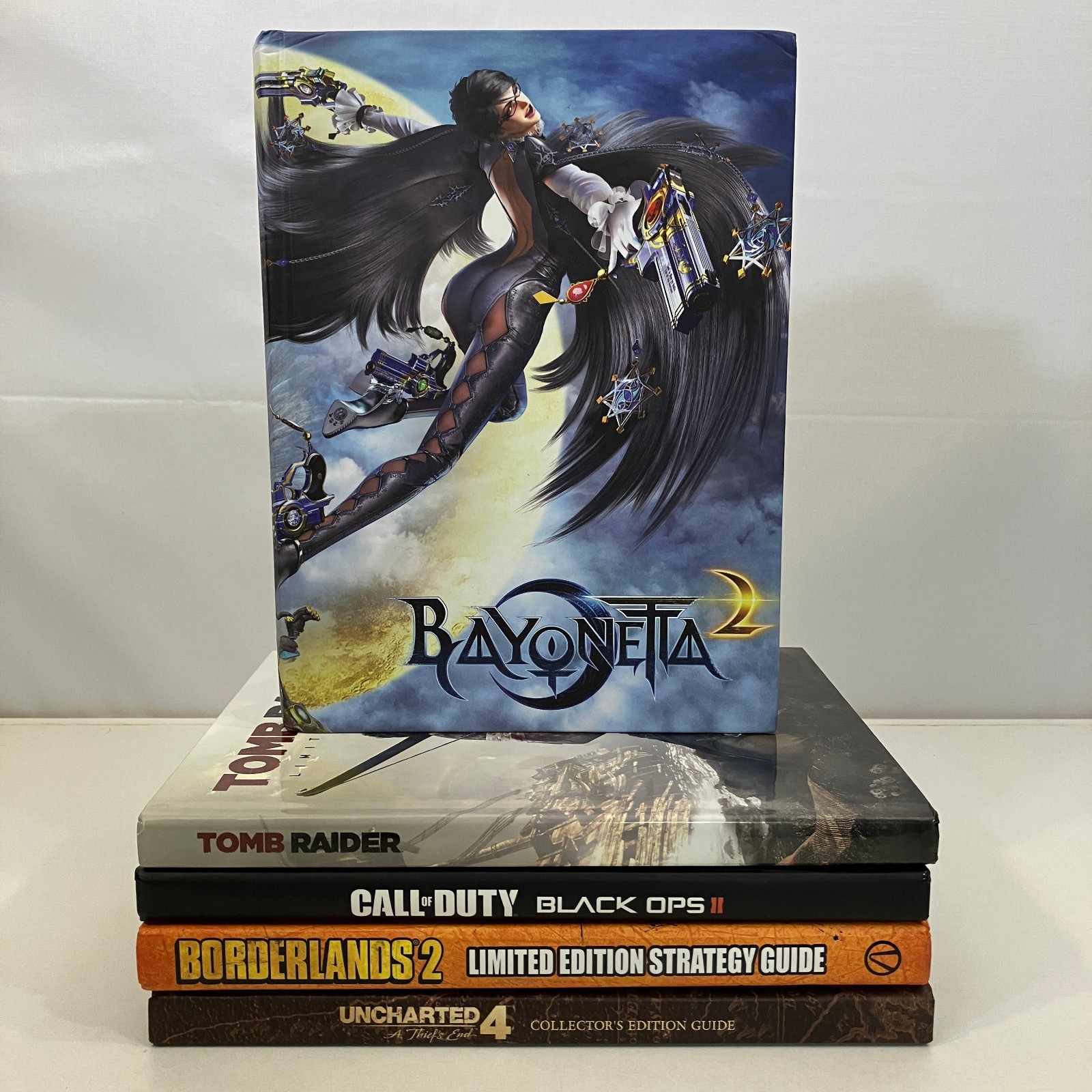 5 Misc Video Game Hardcover Guides Various Editions Lot Bayonetta Uncharted VGC