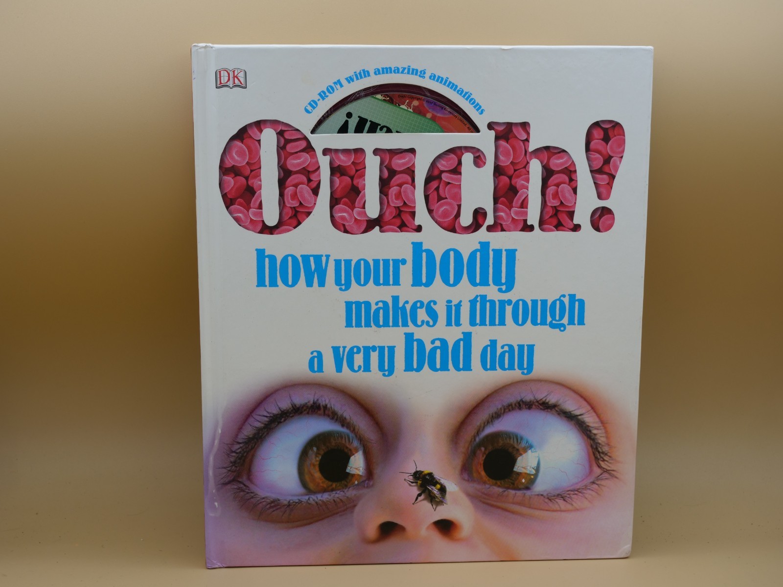 Ouch! How Your Body Makes It Through a Very Bad Day Hardcover VERY GOOD With CD