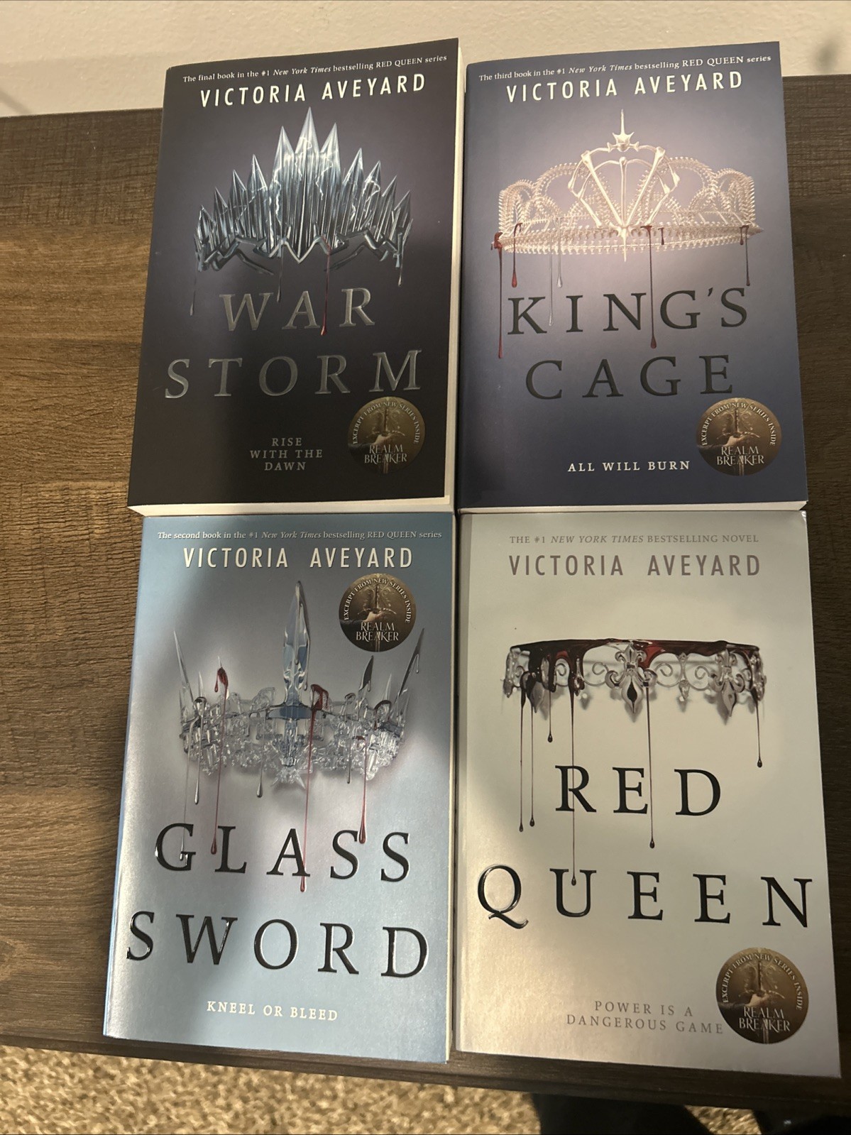 Red Queen, Glass Sword, King’s Cage, War Strom by Victoria Aveyard