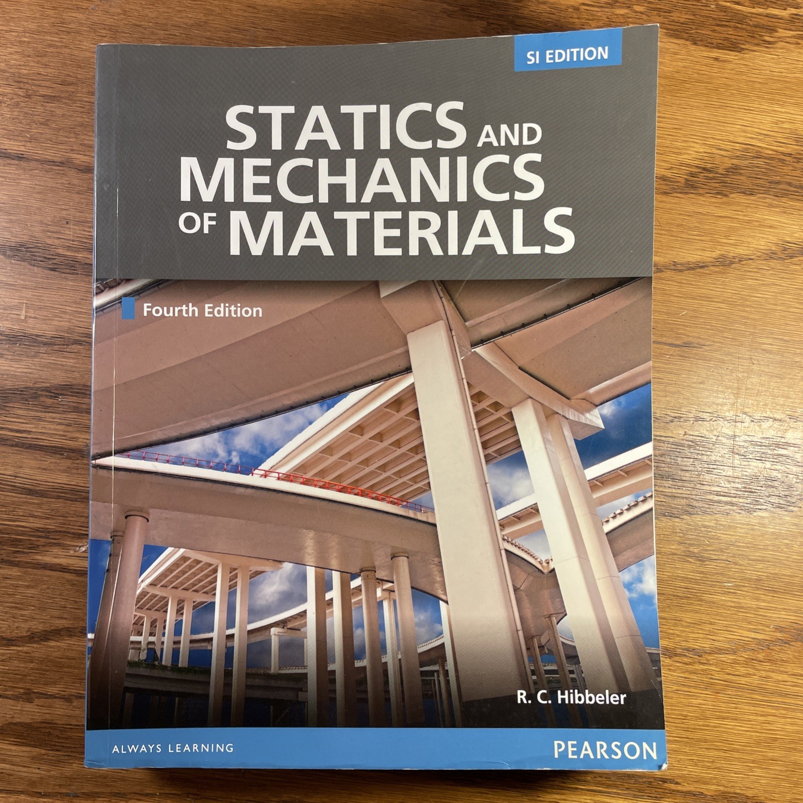Statics and mechanics of materials by R C Hibbeler Fouth SI Edition Pearson