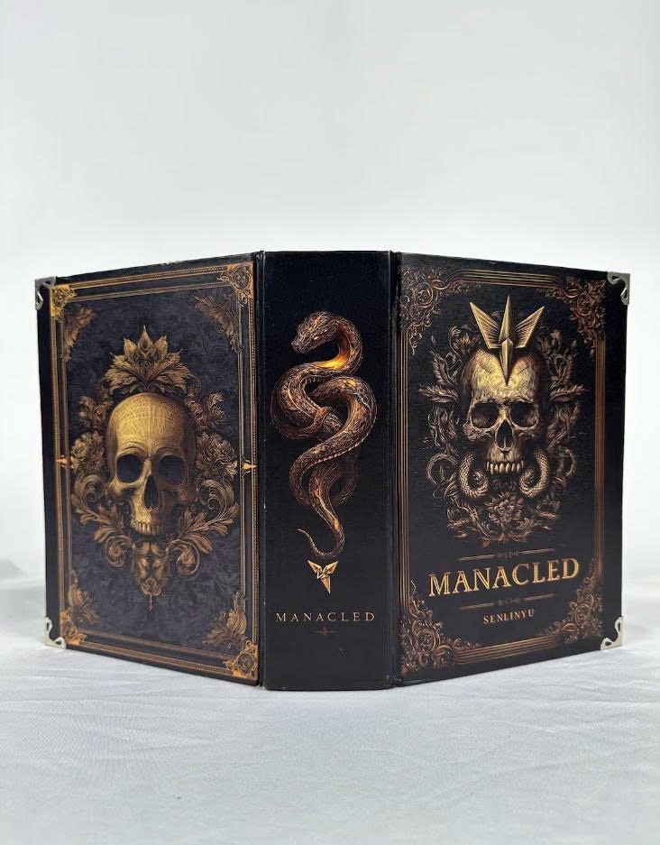 Limited edition hardcover Manacled book with 3 sided color spray bookmark card