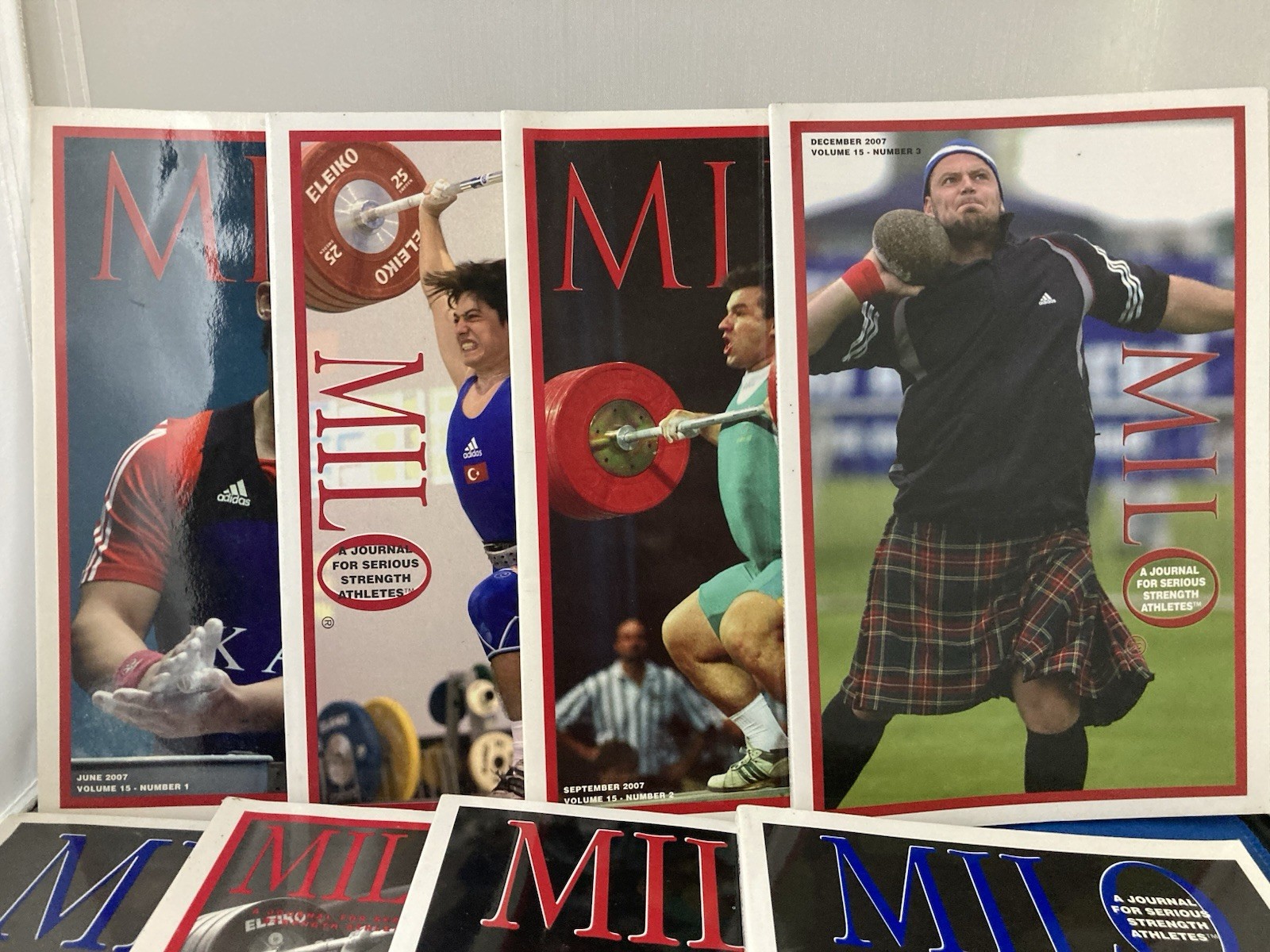 WEIGHTLIFTING-MILO JOURNALS FOR SERIOUS STRENGTH ATHLETES. LOT OF 12. 2005-2007