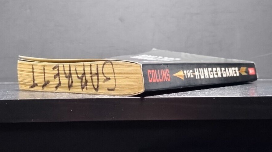 The Hunger Games – Suzanne Collins – 2010 Scholastic – Young Adult Fiction / Dys