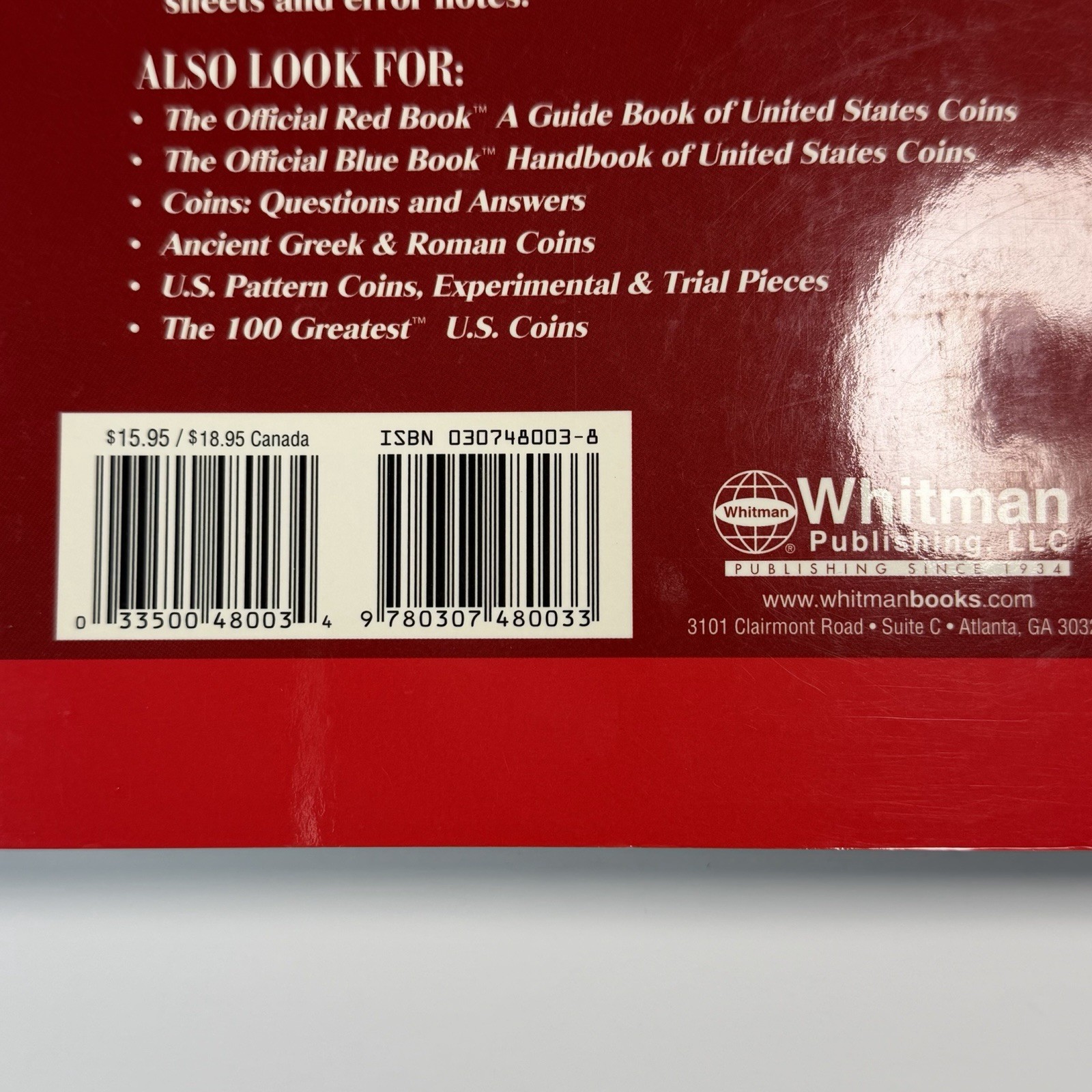 2 paperback books on coins and currency 2006 2009 Whitman Krause Publications
