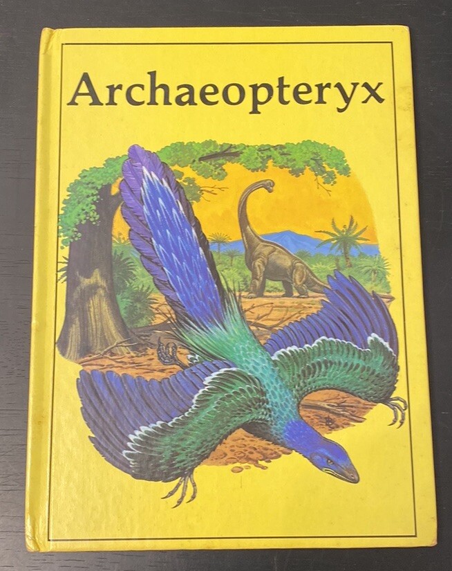 Vintage Rourke Dinosaur Library 7 Books Yellow Orange Peach Decorative Bookshelf