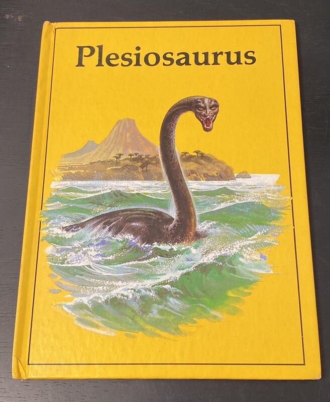 Vintage Rourke Dinosaur Library 7 Books Yellow Orange Peach Decorative Bookshelf