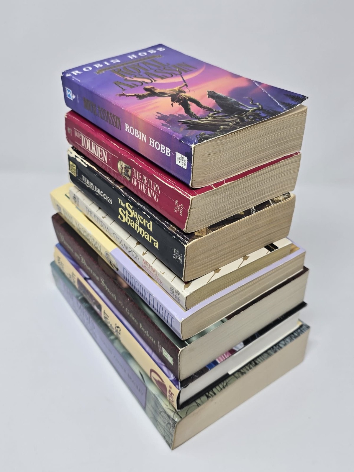 Epic Fantasy Lot of 8 – Tolkien, McCaffrey, Hobb, Brooks, Moorcock & More