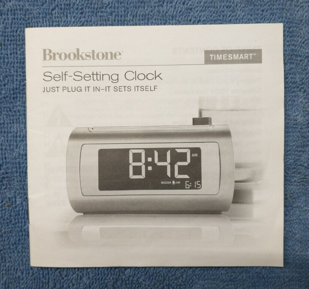 Brookstone Timesmart Self-Setting Clock Owner’s Instruction Manual, 18 pages