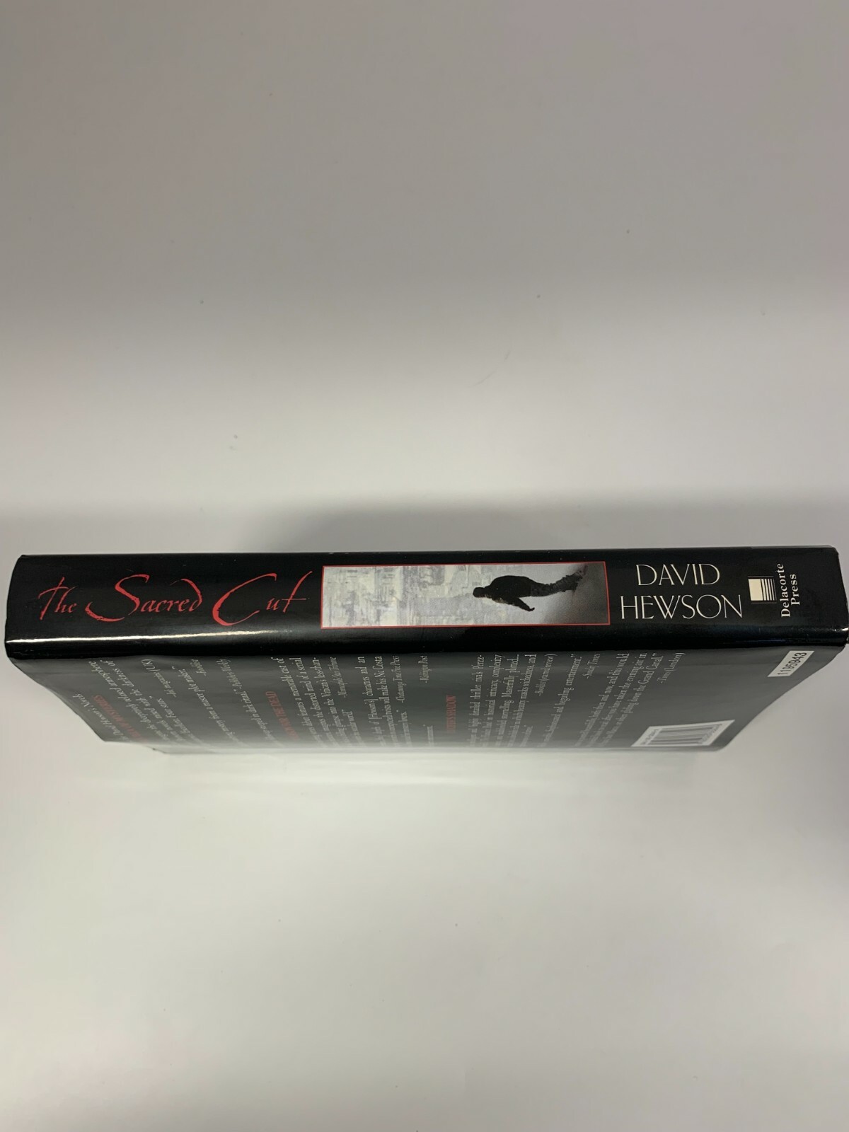 Delacorte Press The Sacred Cut by David Hewson A Novel Of Suspense Hardcover
