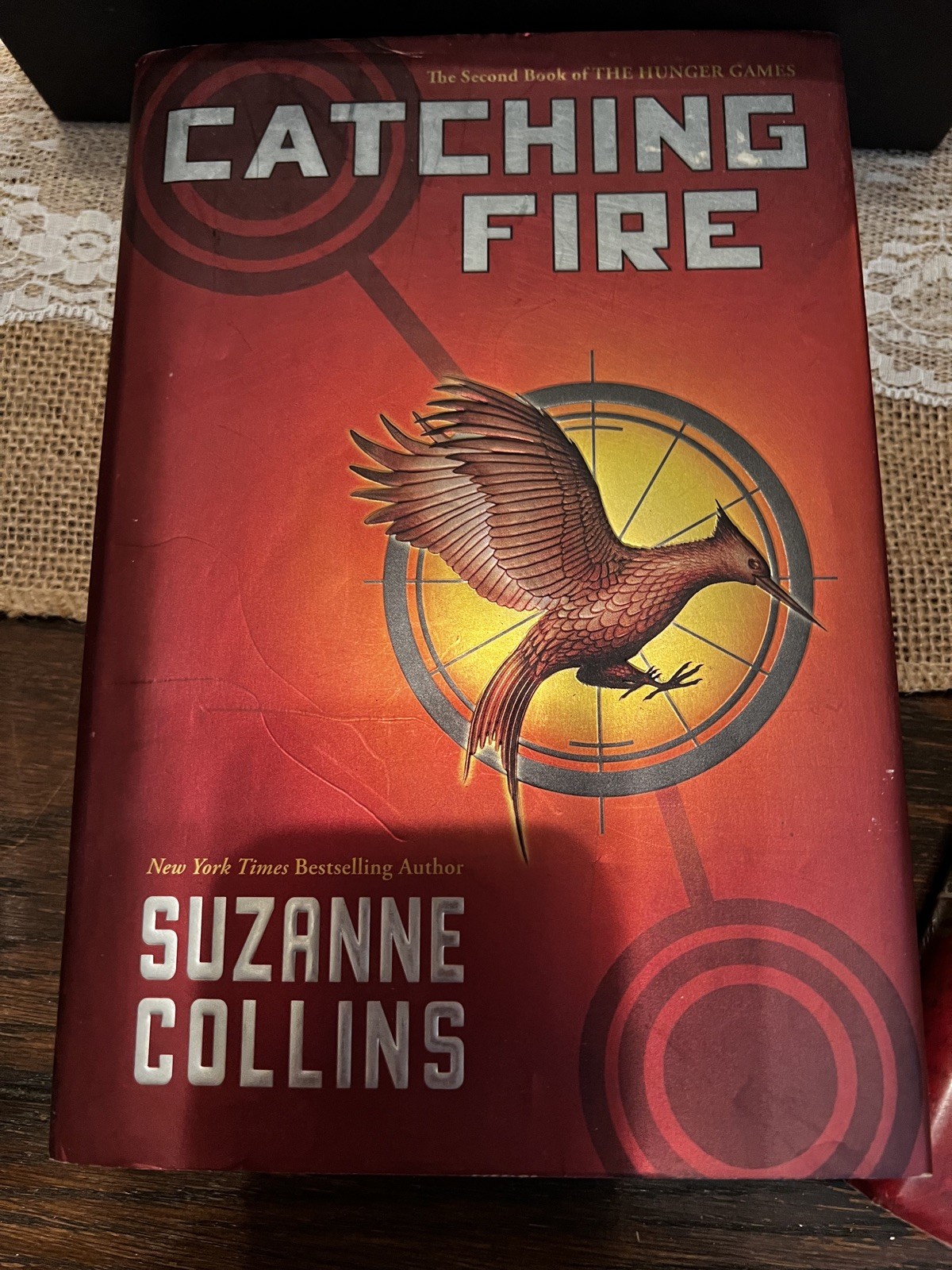 Lot of 4 Hardcover Books –Dan Brown,Suzanne Collins, JamesPatterson,Nora Roberts