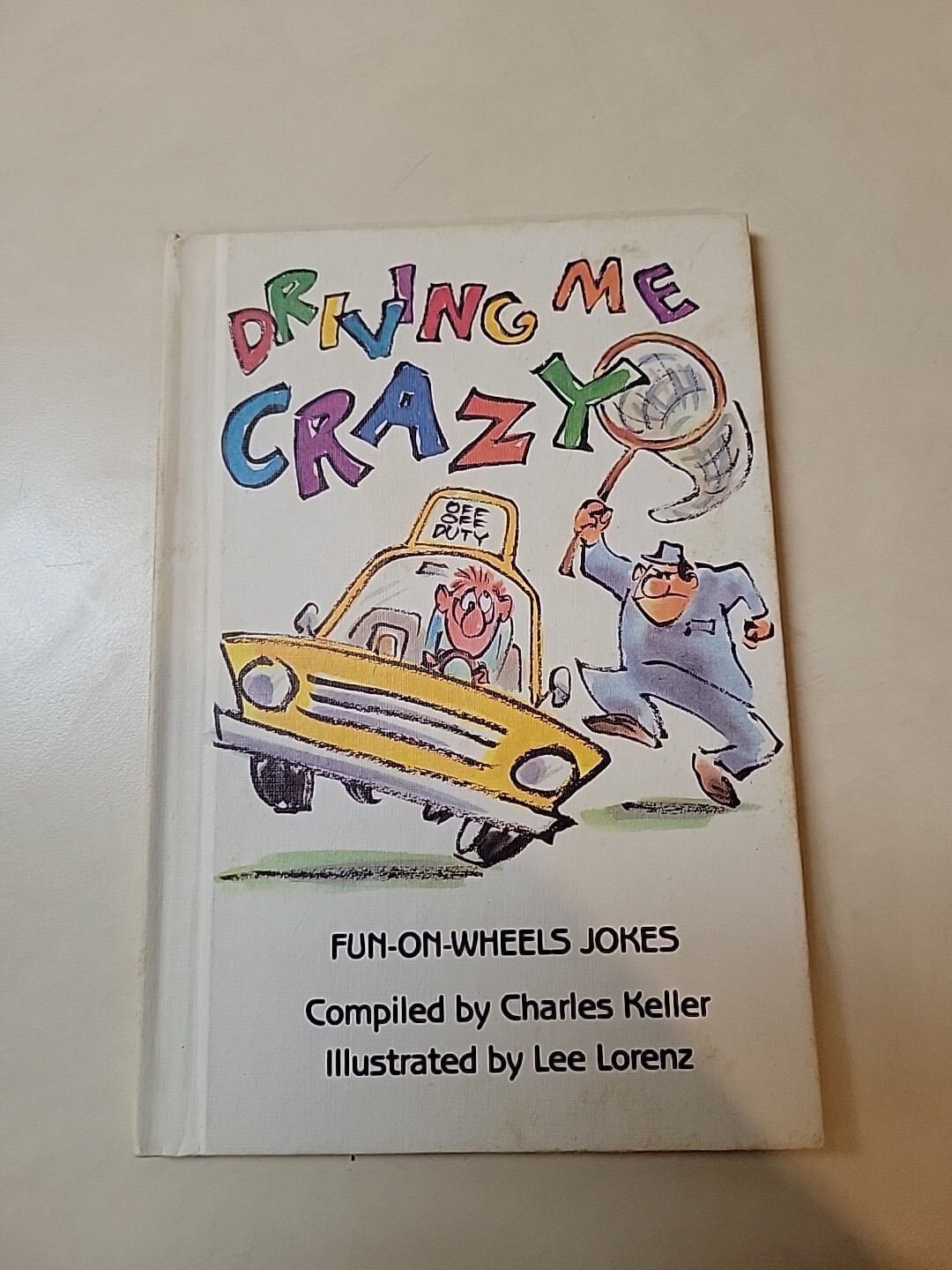 DRIVING ME CRAZY: FUN ON WHEELS JOKES By Charles Keller & Lee Lorenz – 1989