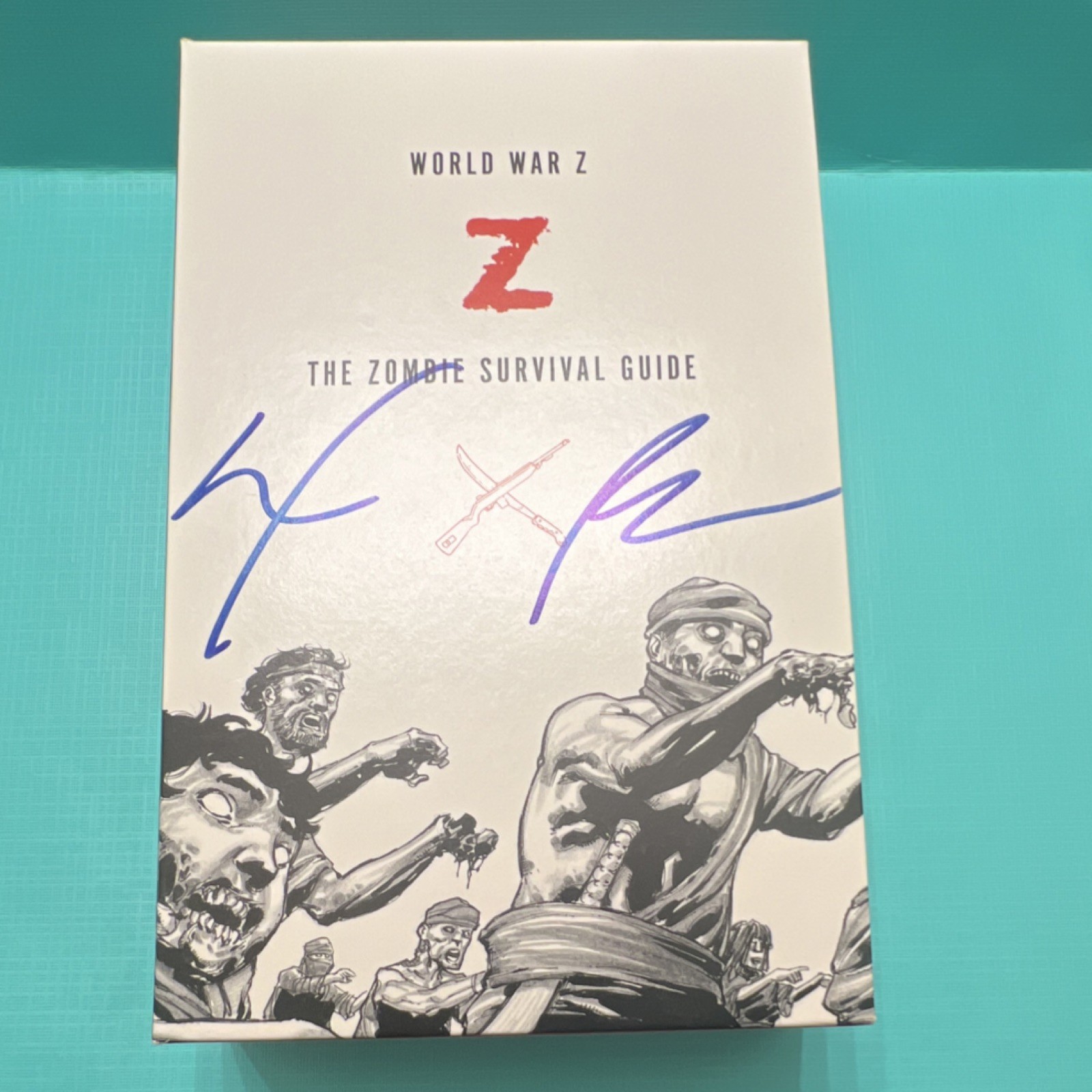 Max Brooks Signed World War Z & The Zombie Survival Guide Paperback Set