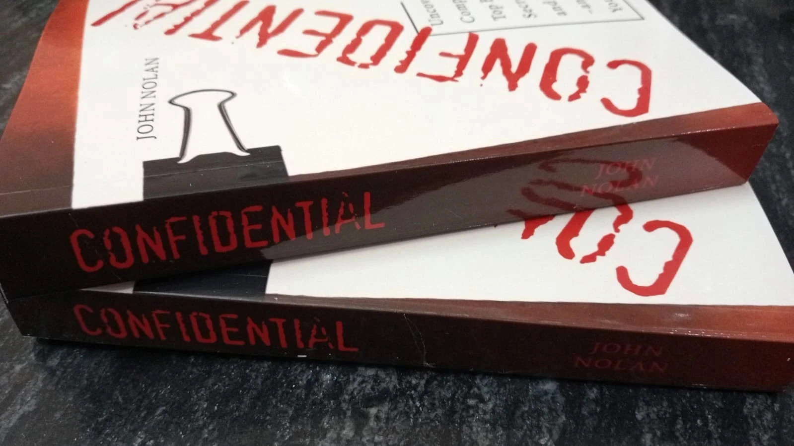 CONFIDENTIAL WRITTEN BY JOHN NOLAN PAPERBACK