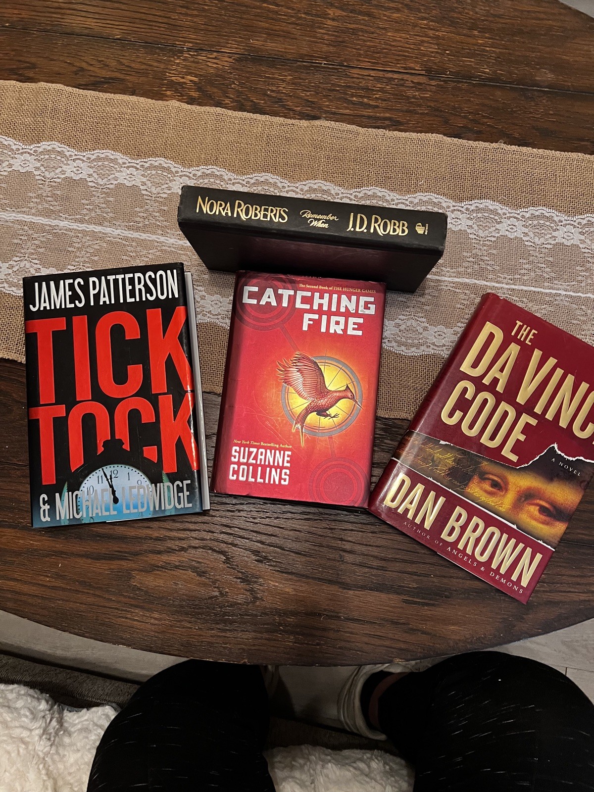 Lot of 4 Hardcover Books –Dan Brown,Suzanne Collins, JamesPatterson,Nora Roberts
