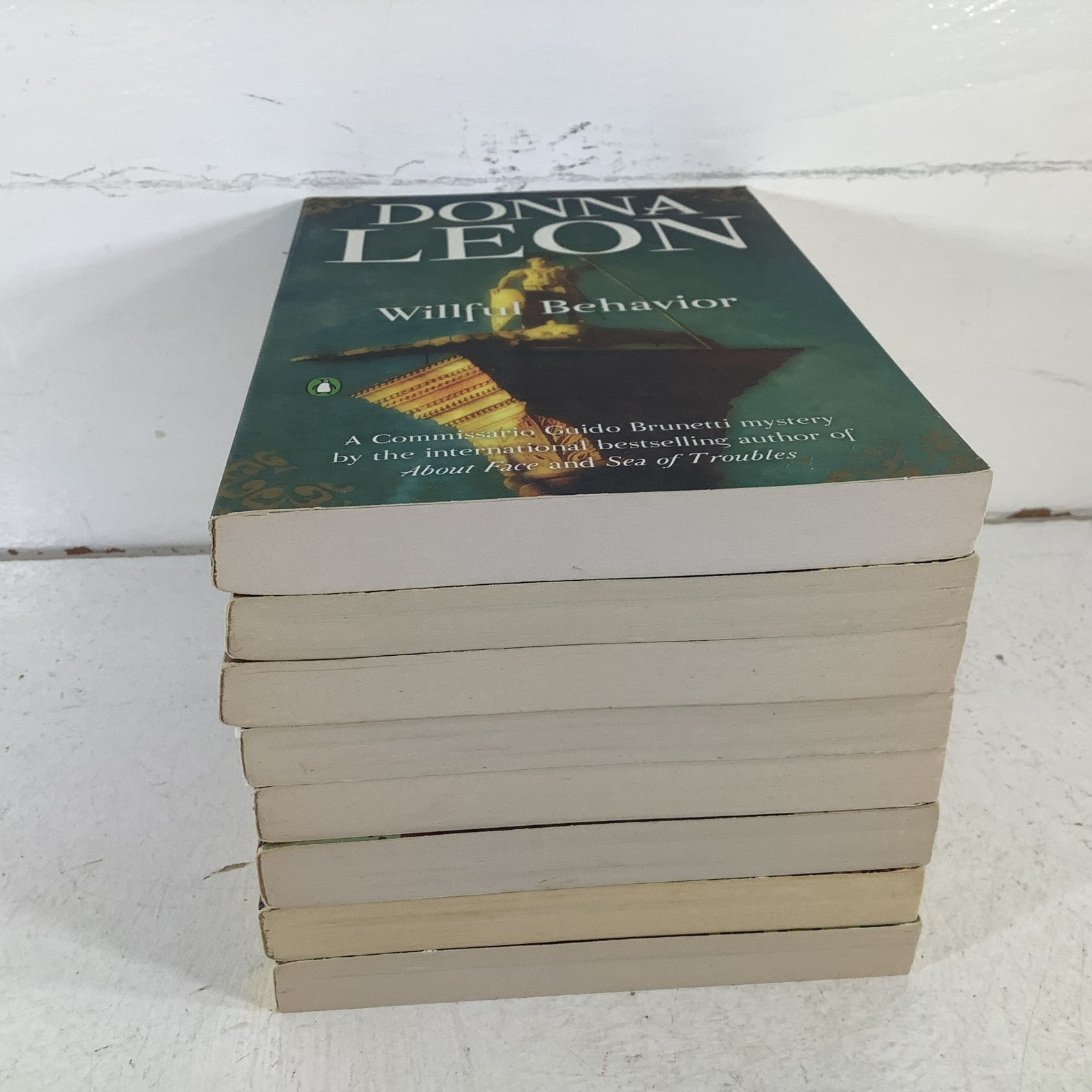 Donna Leon lot of 8 Commissario Guido Brunetti Mystery Series Trade PB Like New